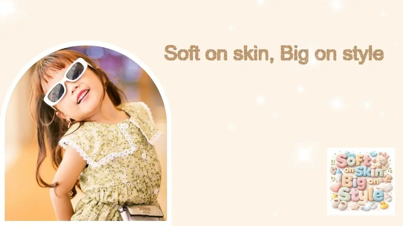 hero section image for kidocom.com with text : soft on skin, big on style. a small girl giving pose in style